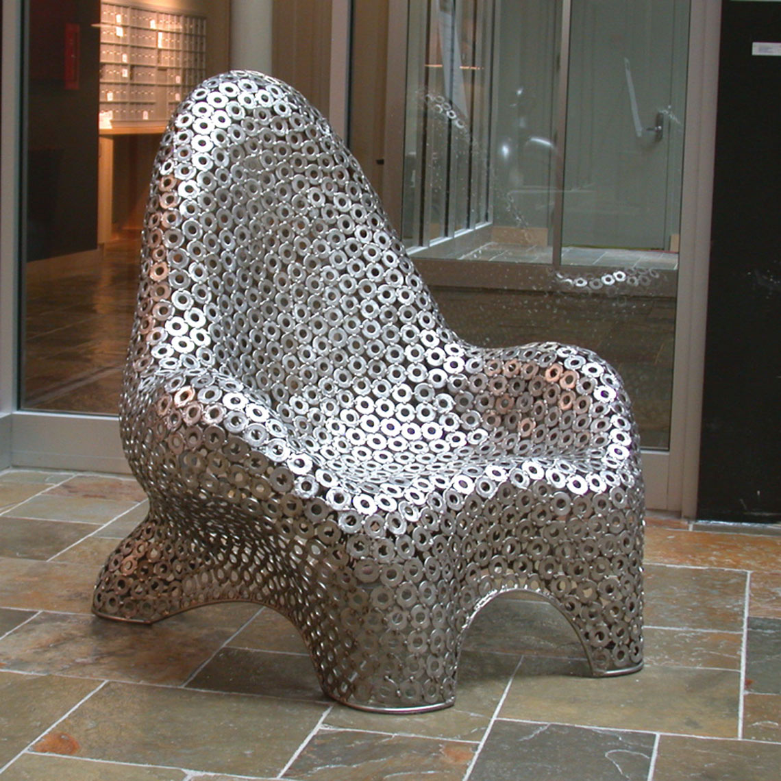 Sculptural public seating in stainless steel by Peter Diepenbrock Providence and Jamestown  RI