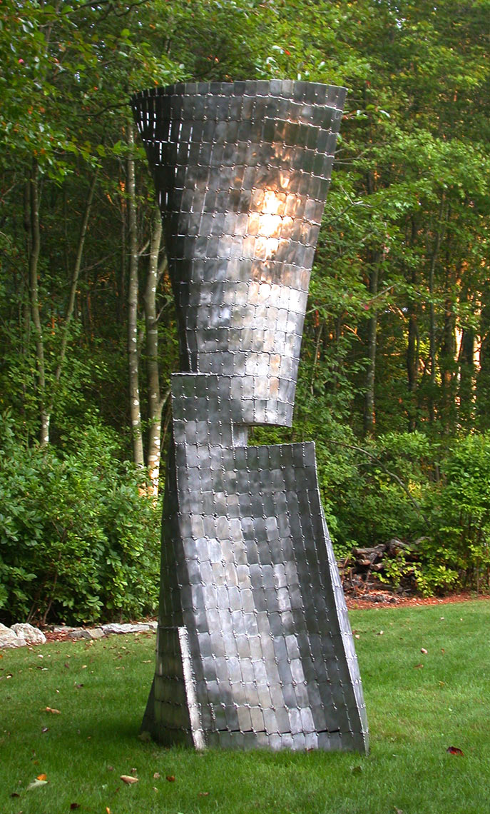 Monogenesis IV a Free standing stainless steel sculpture by Peter Diepenbrock