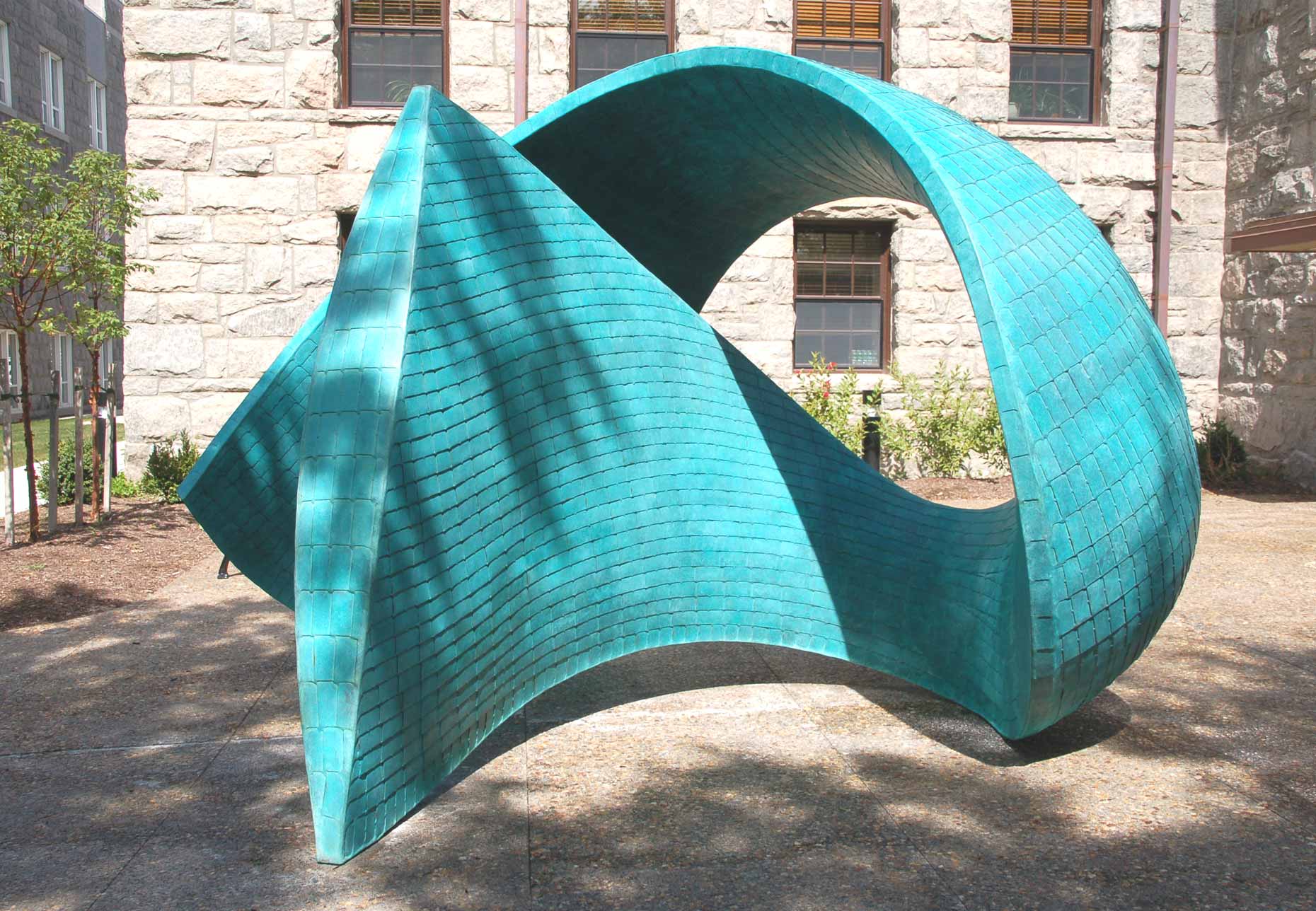 Torsion III a bronze sculpture By Peter Diepenbrock for The University of Rhode Island